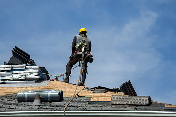 Professional Roof Replacement technician working in Camden, NY